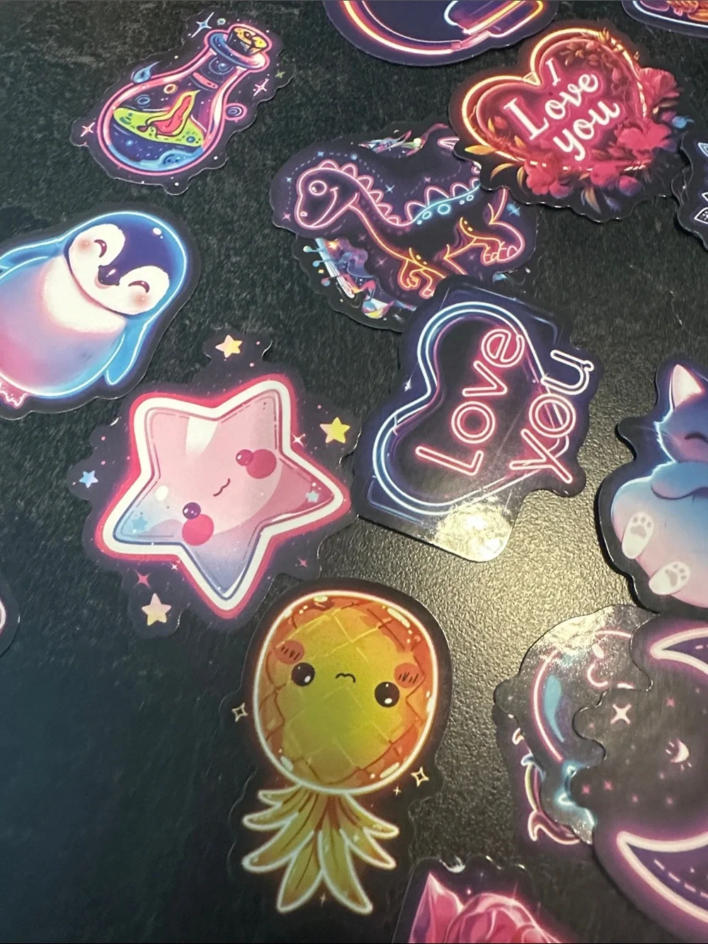 Assorted pack of stickers. Most are 2x2 inches